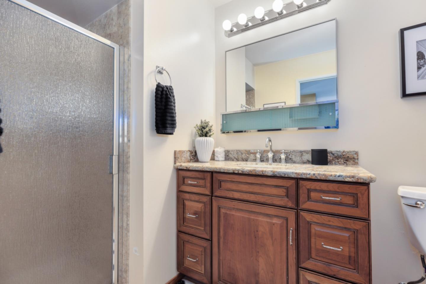 75 Simpson Drive Walnut Creek, CA 94596 - Photo 15 of 48 a bathroom with a sink and a mirror