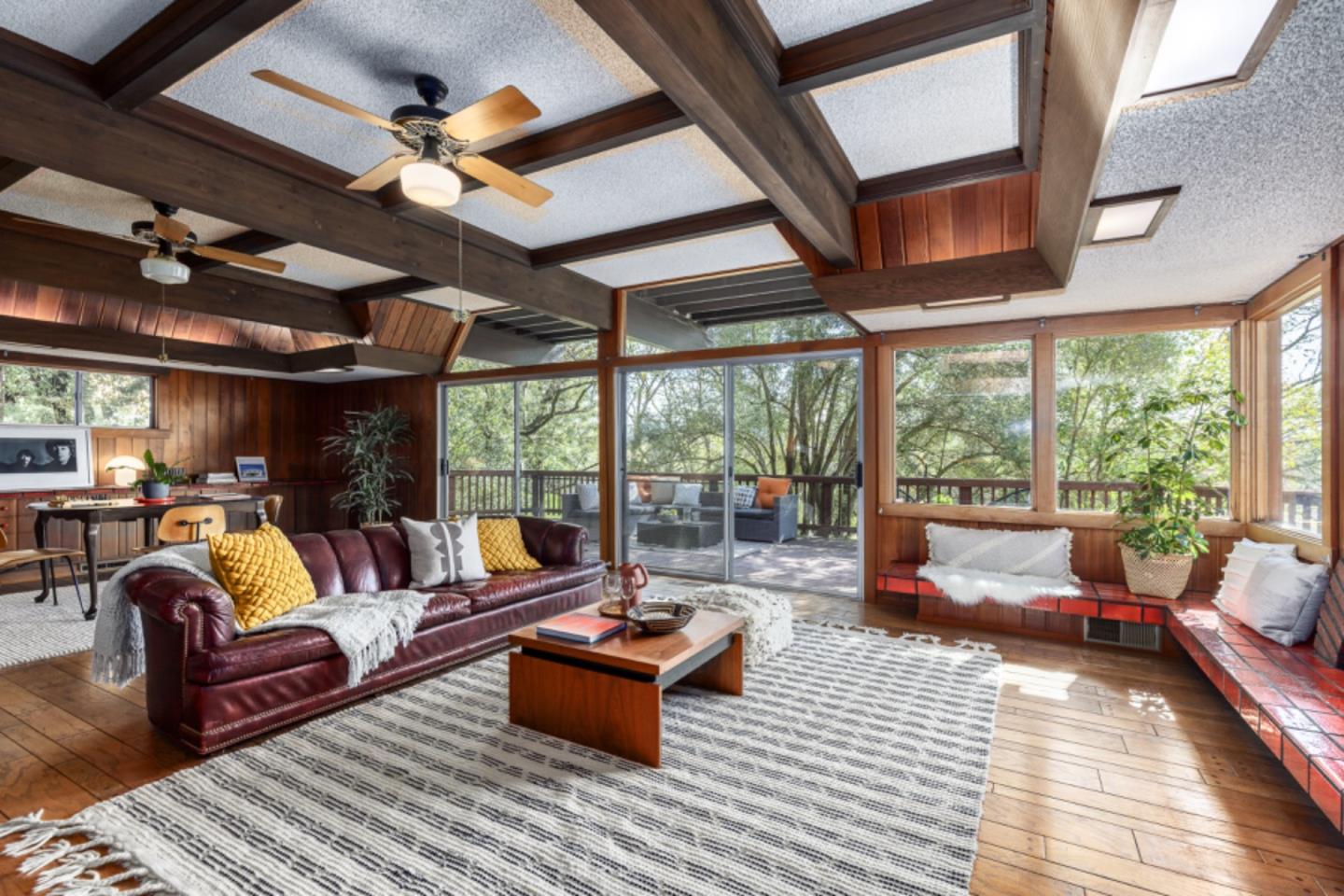 75 Simpson Drive Walnut Creek, CA 94596 - Photo 26 of 48 a living room with furniture a ceiling fan and a large window