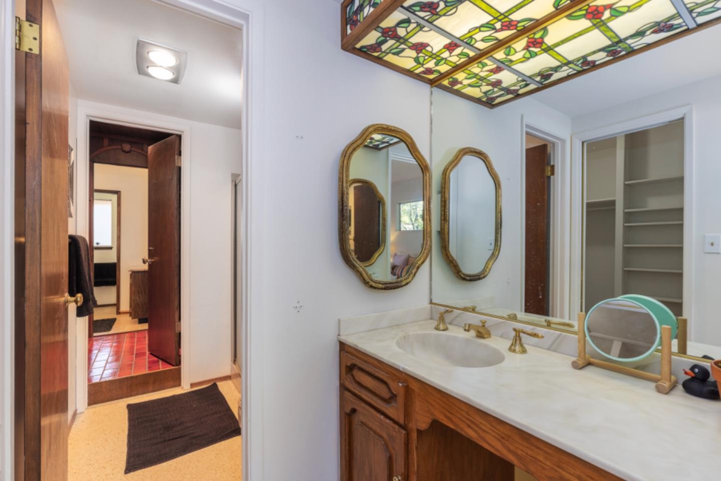 75 Simpson Drive Walnut Creek, CA 94596 - Photo 35 of 48 a bathroom with a sink and a mirror
