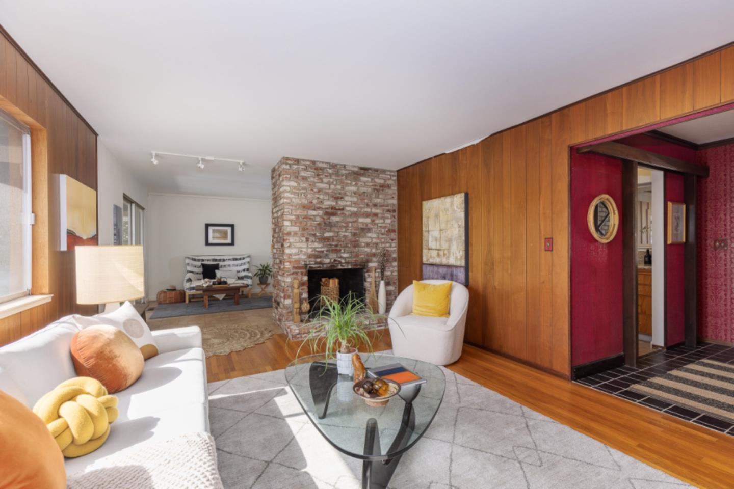 75 Simpson Drive Walnut Creek, CA 94596 - Photo 4 of 48 a living room with furniture a rug and a fireplace