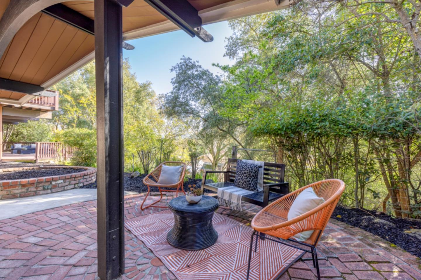 75 Simpson Drive Walnut Creek, CA 94596 - Photo 46 of 48 a view of a patio with table and chairs and potted plants