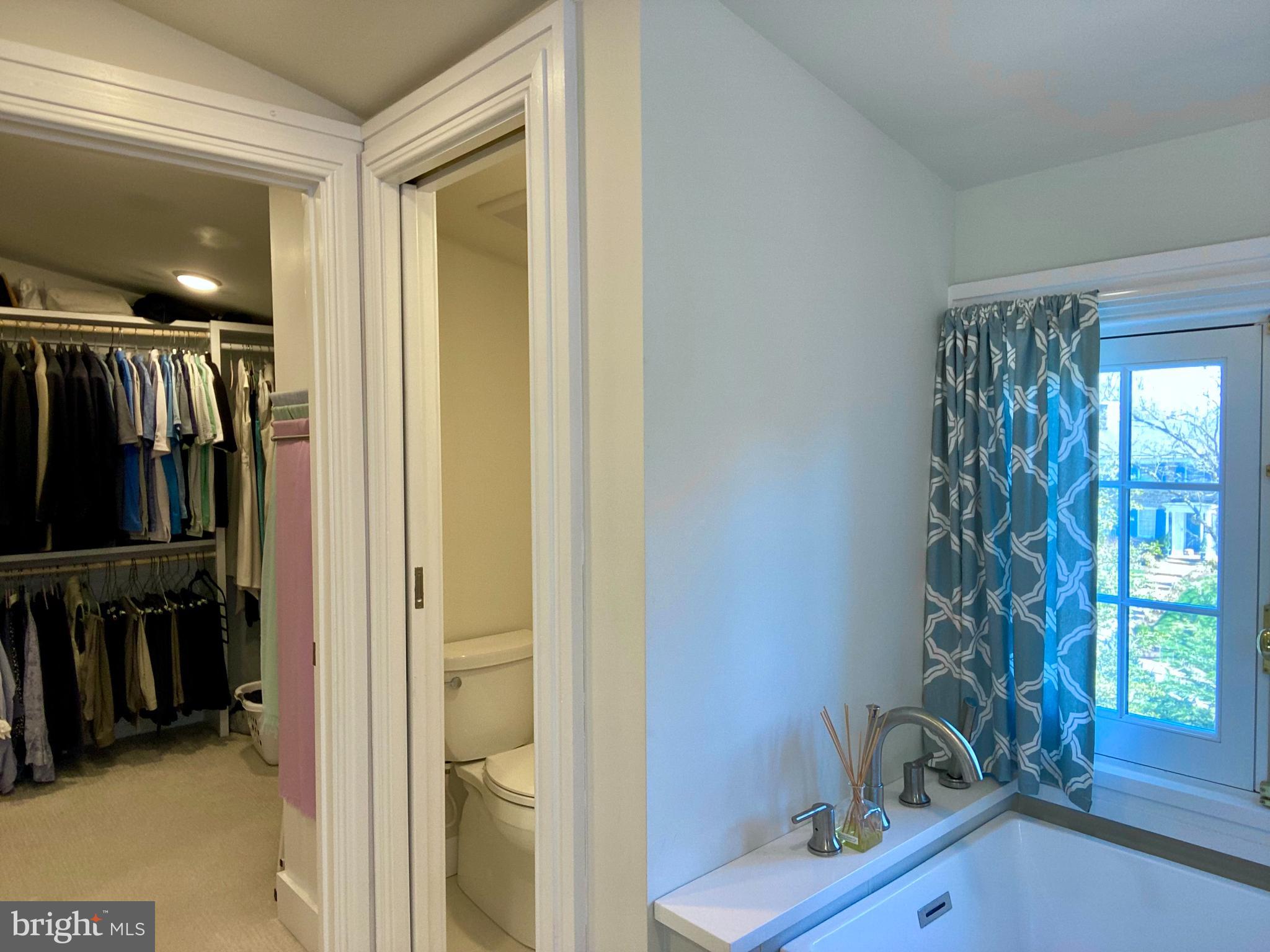 121 Upnor Road Baltimore, MD 21212 - Photo 54 of 79 a view of walk in closet with clothes and shoes