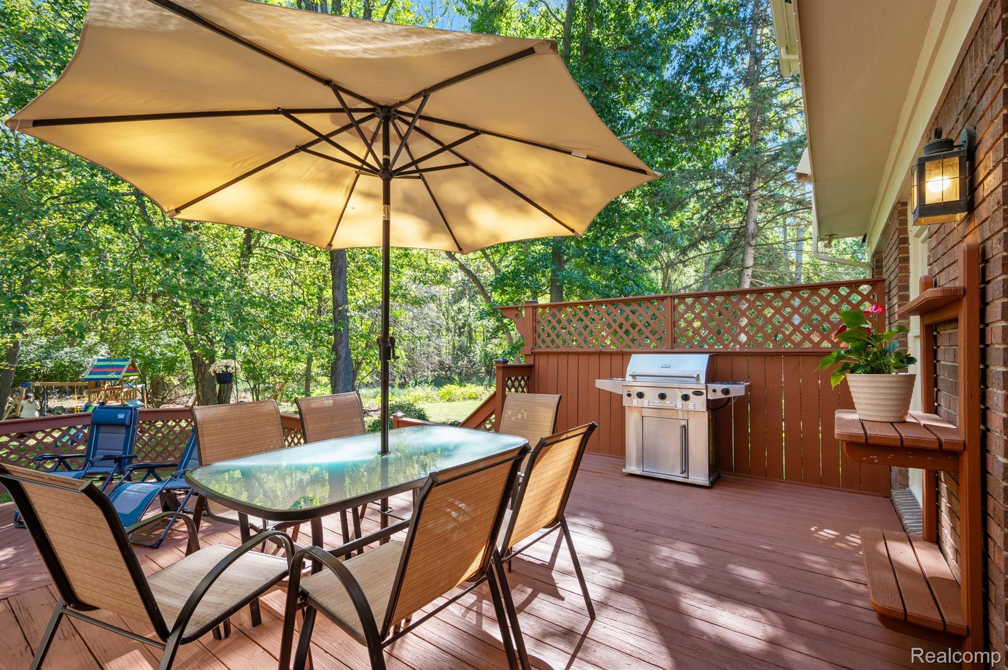 713 River Bend Drive Rochester, MI 48307 - Photo 37 of 68 Two tier deck overlooks a private wooded area
