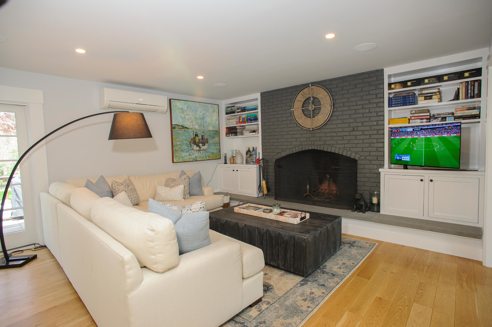31 North Street Edgartown, MA 02539 - Photo 22 of 49 a living room with furniture and a fireplace