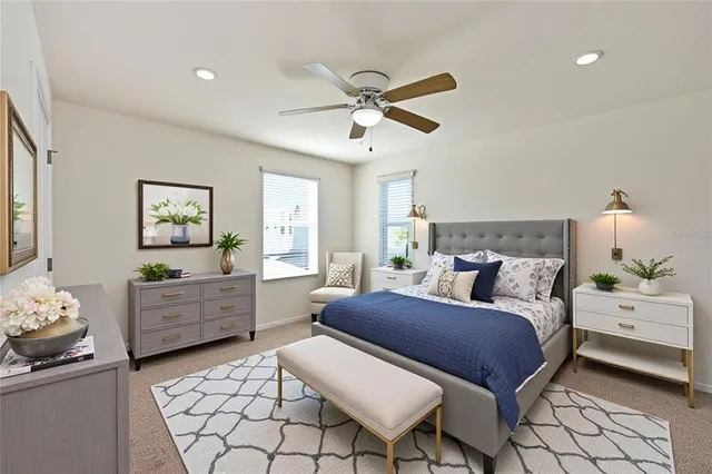 a bedroom with a bed and furniture