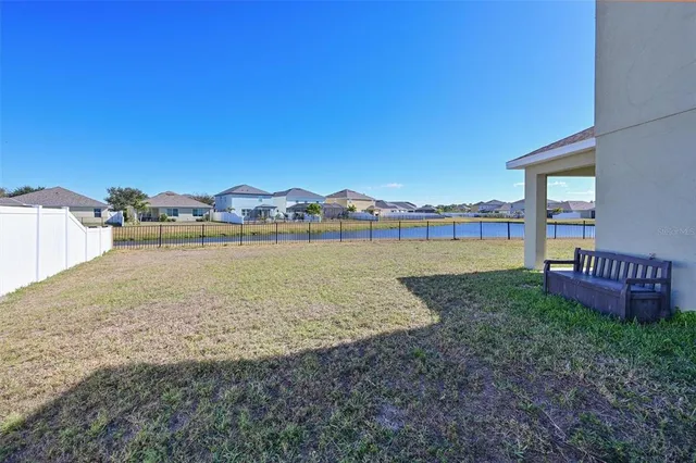 a view of a garden with a lake view