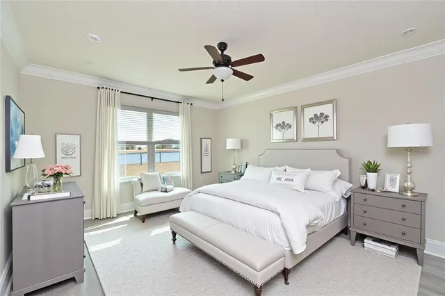 a bedroom with a bed and a couch