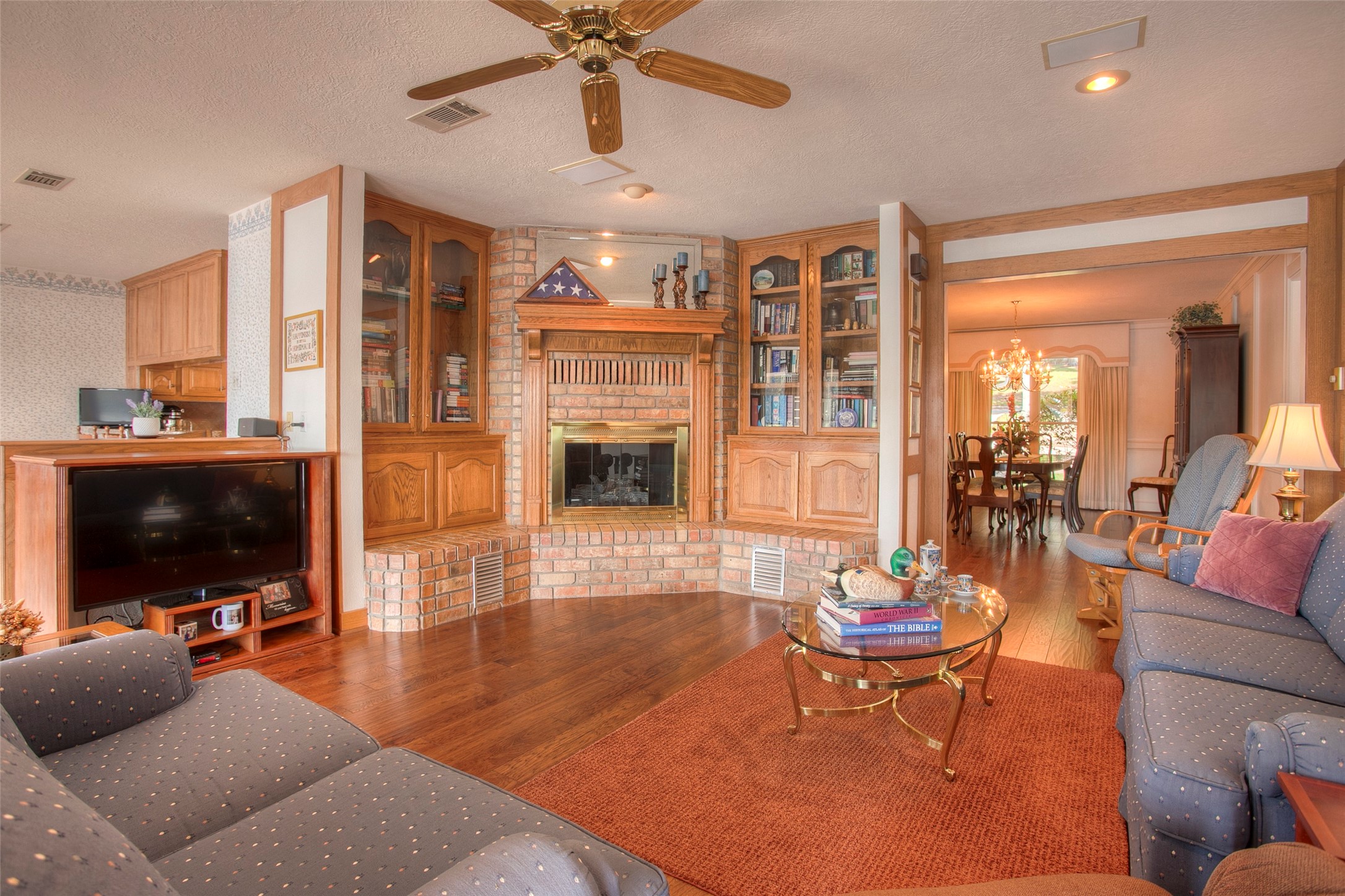 2008 Wickersham Drive Huntsville, TX 77340 - Photo 18 of 49 a living room with furniture and a flat screen tv