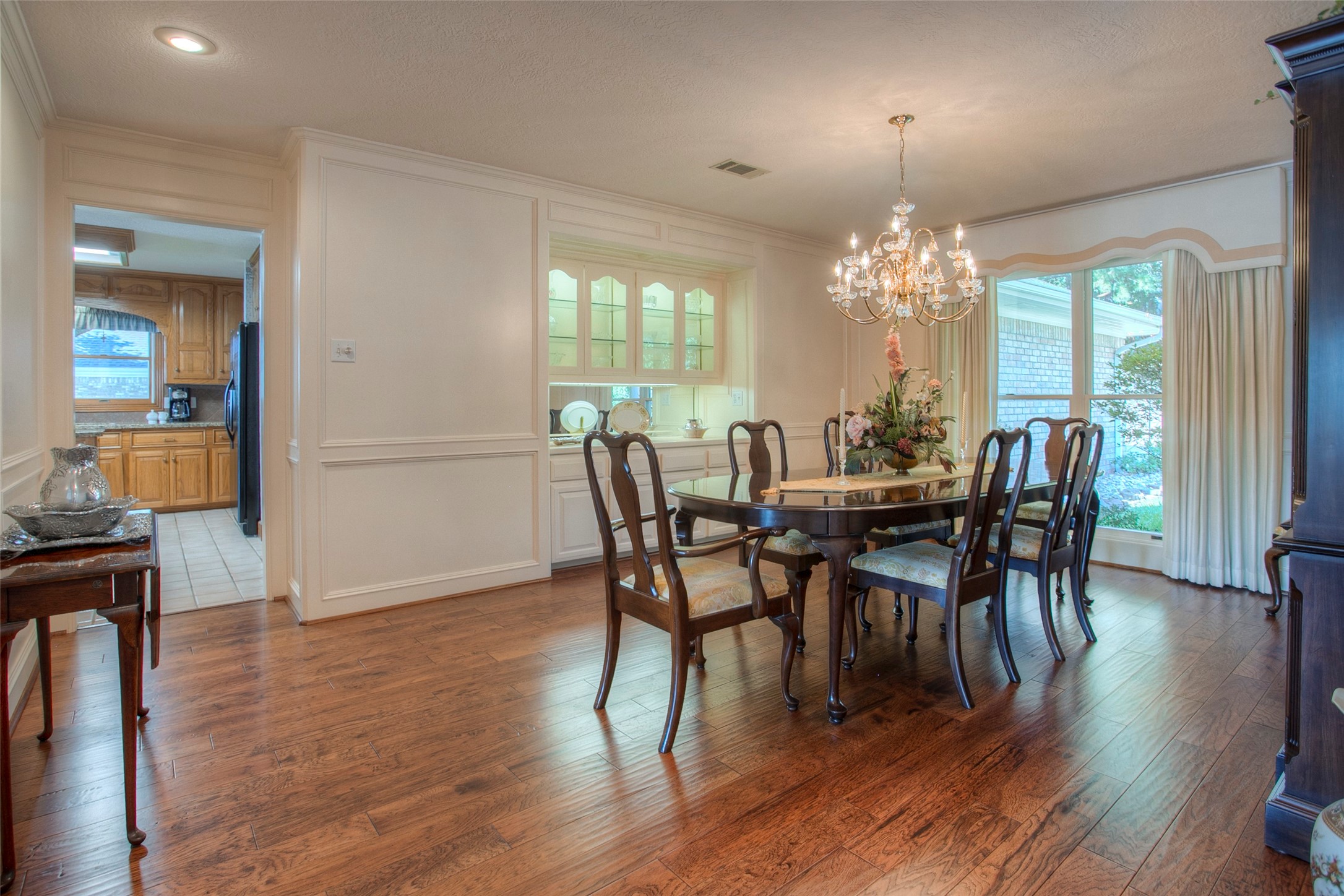 2008 Wickersham Drive Huntsville, TX 77340 - Photo 18 of 49 a view of a dining room with furniture window and wooden floor
