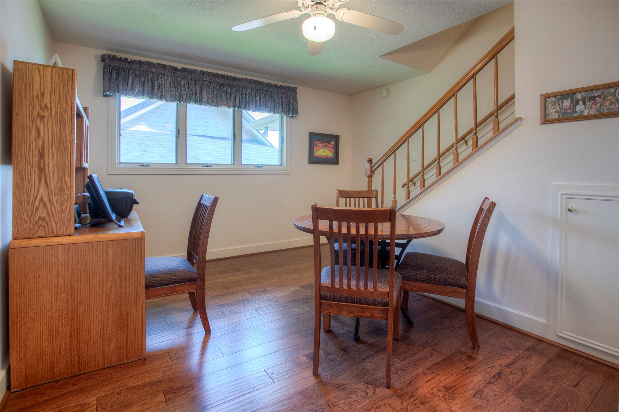 2008 Wickersham Drive Huntsville, TX 77340 - Photo 37 of 49 a view of a a dining room with furniture window and wooden floor