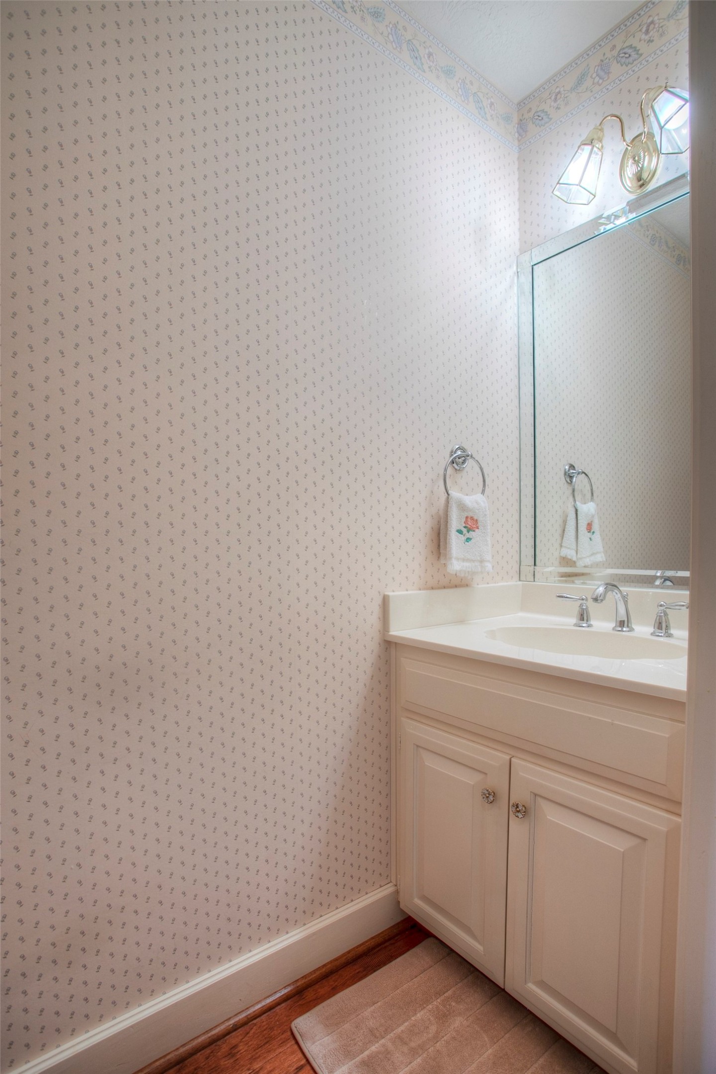 2008 Wickersham Drive Huntsville, TX 77340 - Photo 38 of 49 a bathroom with a sink and a mirror