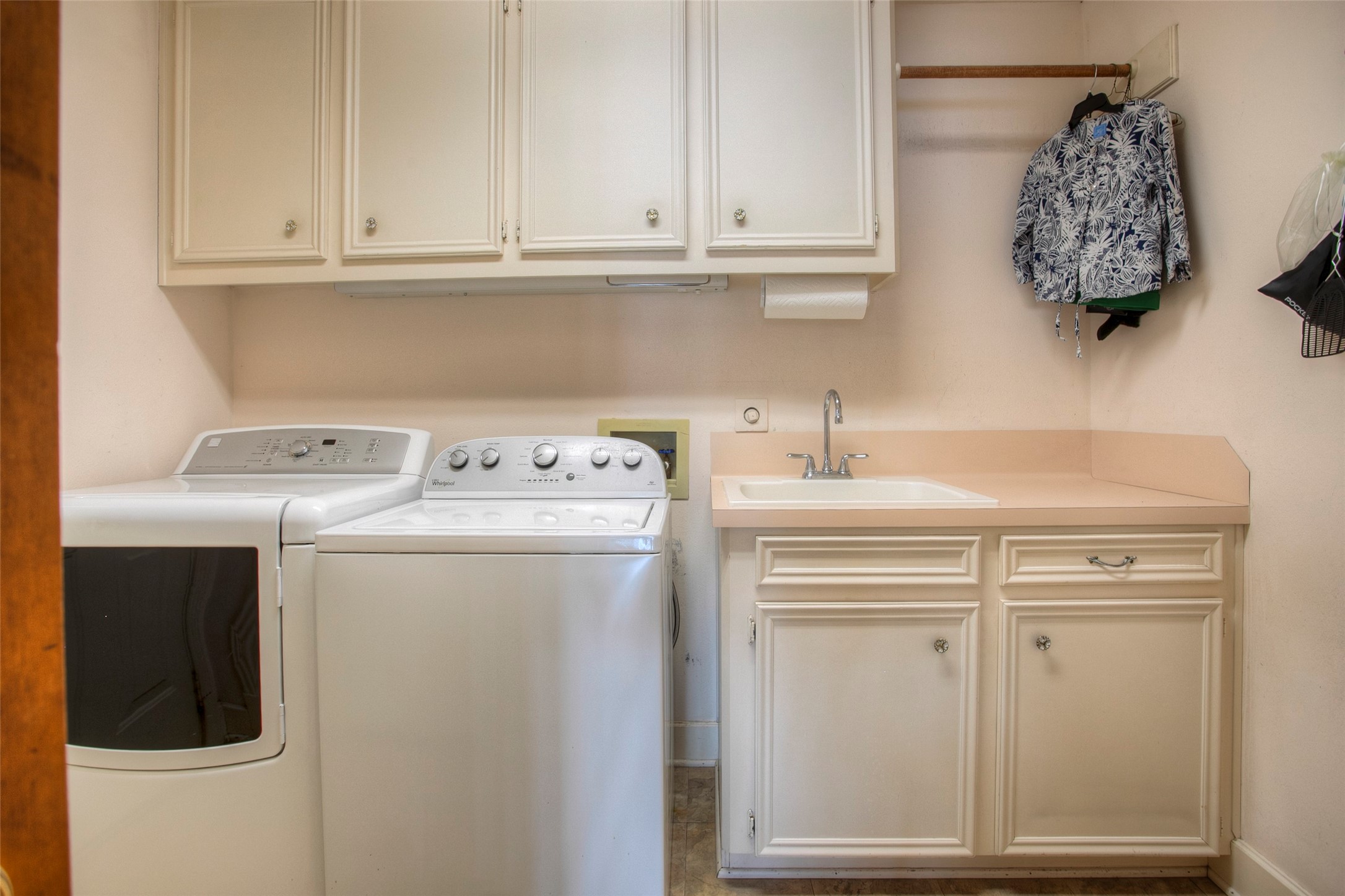 2008 Wickersham Drive Huntsville, TX 77340 - Photo 45 of 49 a view of storage and utility room with washer and dryer