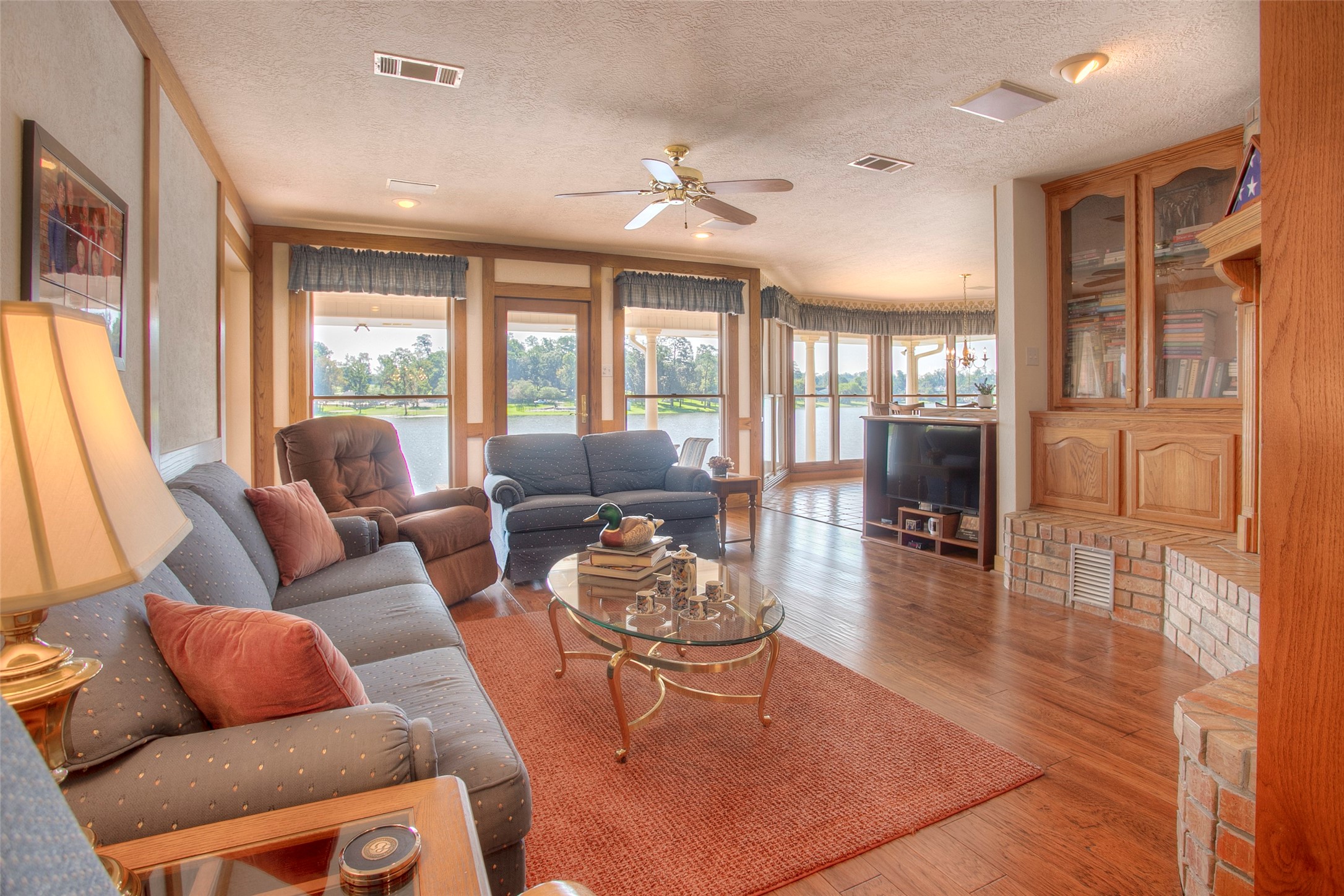 2008 Wickersham Drive Huntsville, TX 77340 - Photo 6 of 49 a living room with furniture and large windows