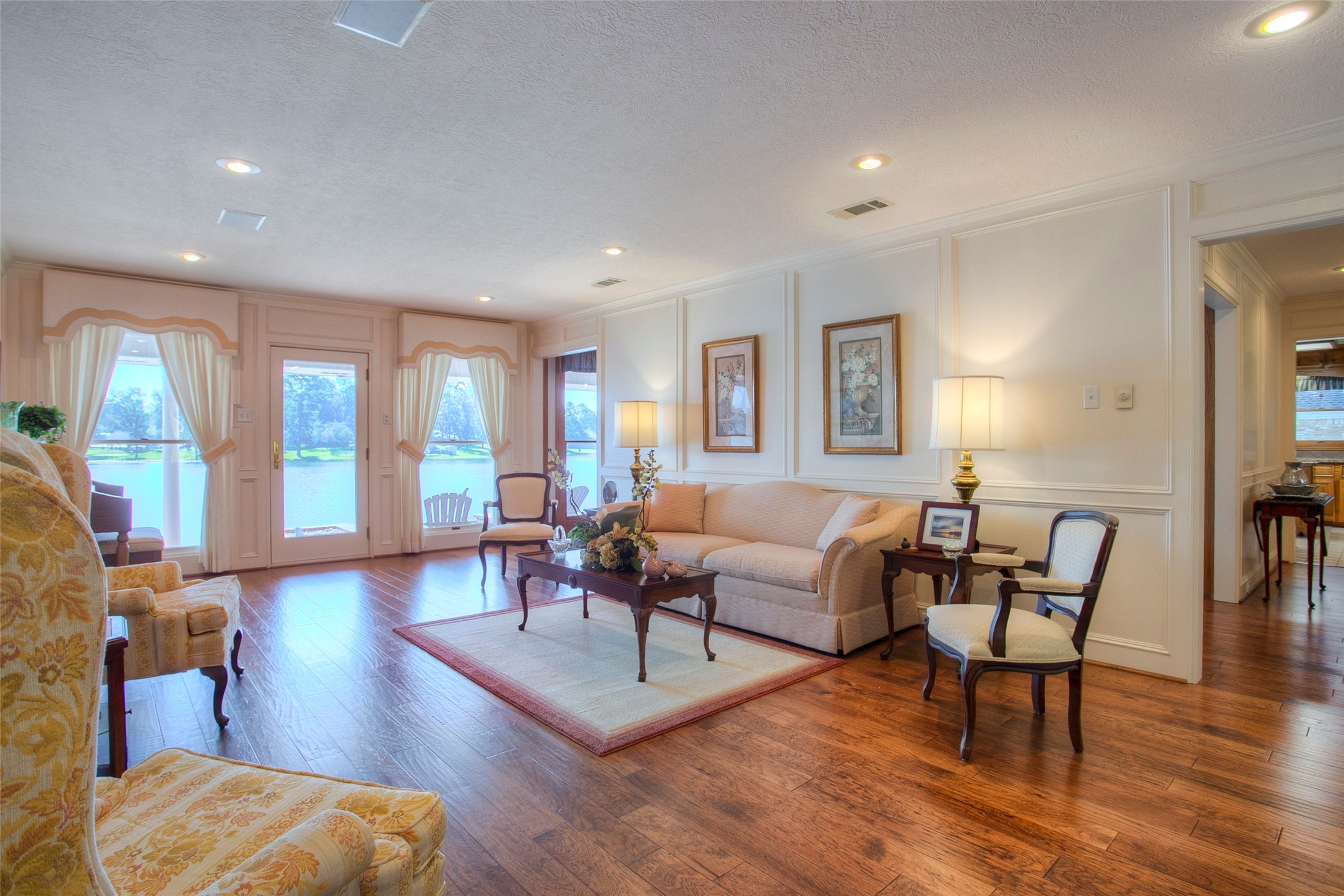 2008 Wickersham Drive Huntsville, TX 77340 - Photo 7 of 49 a living room with furniture and a wooden floor