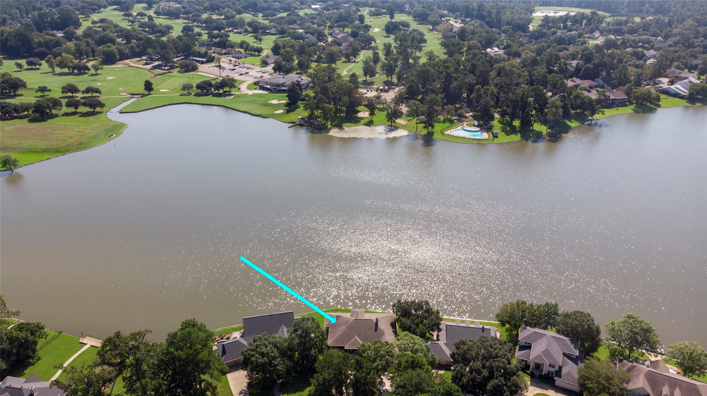 2008 Wickersham Drive Huntsville, TX 77340 - Photo 10 of 49 an aerial view of a house with a lake view