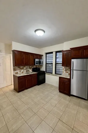 a large kitchen with a cabinets and counter space