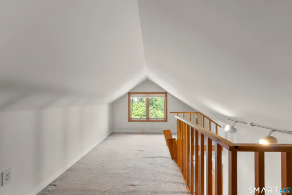 a view of hallway with stairs