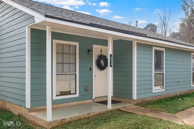 a view of a porch with a door