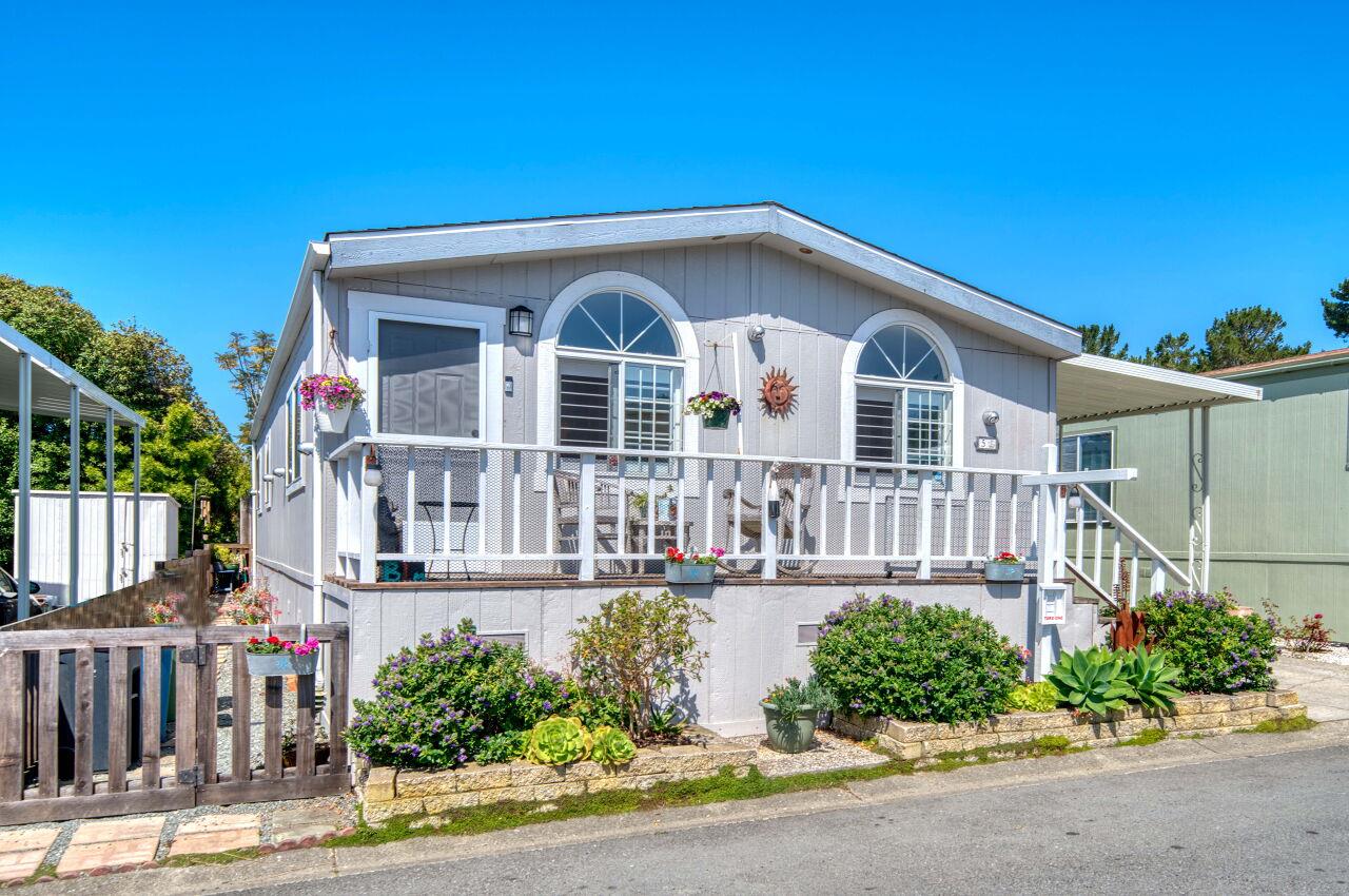 5 Lighthouse Road, Unit 5 Half Moon Bay, CA 94019 - Photo 1 of 25 a front view of a house with a yard