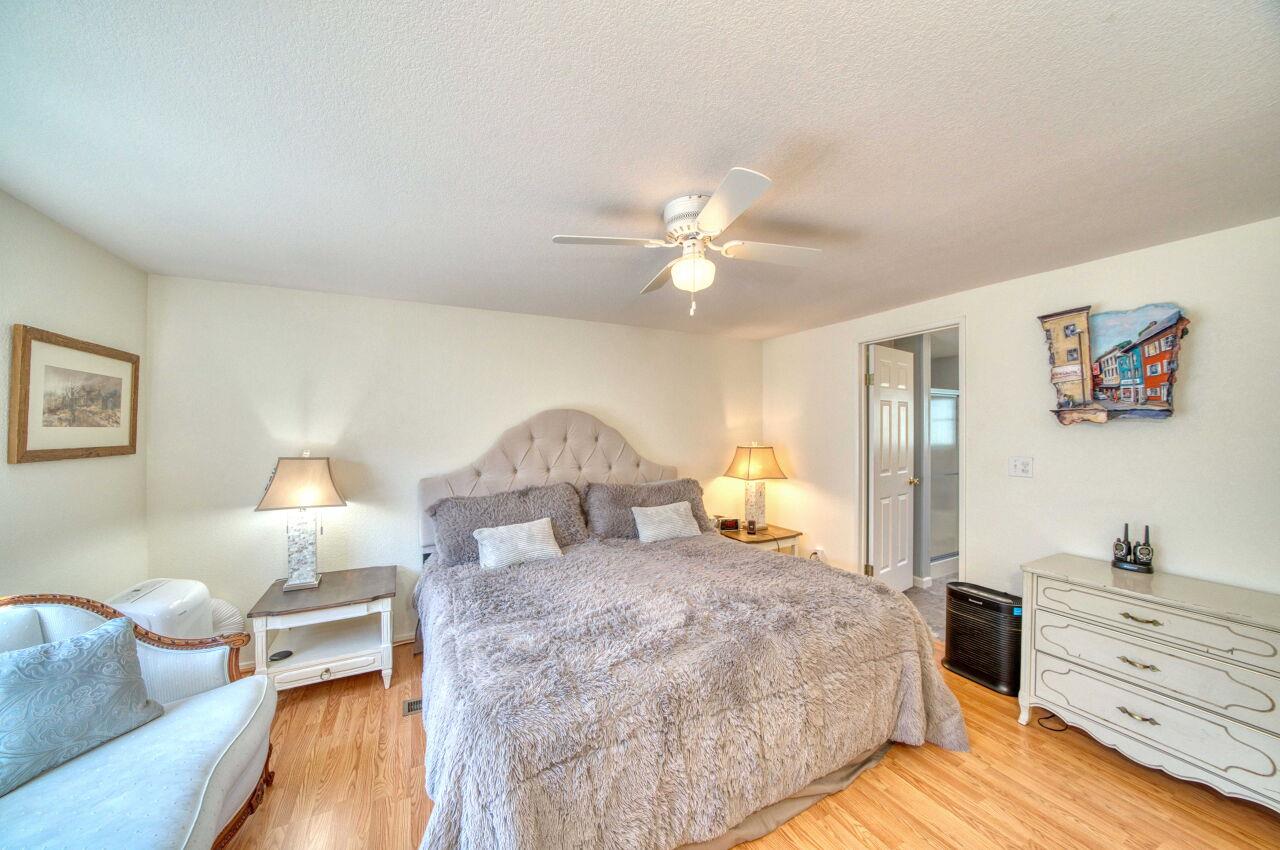 5 Lighthouse Road, Unit 5 Half Moon Bay, CA 94019 - Photo 14 of 25 a bed room with a bed and a lamp