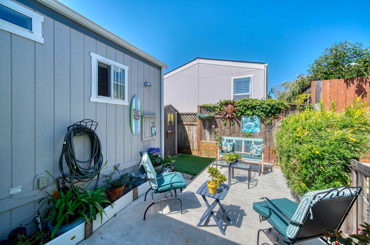 5 Lighthouse Road, Unit 5 Half Moon Bay, CA 94019 - Photo 20 of 25 a patio with table and chairs