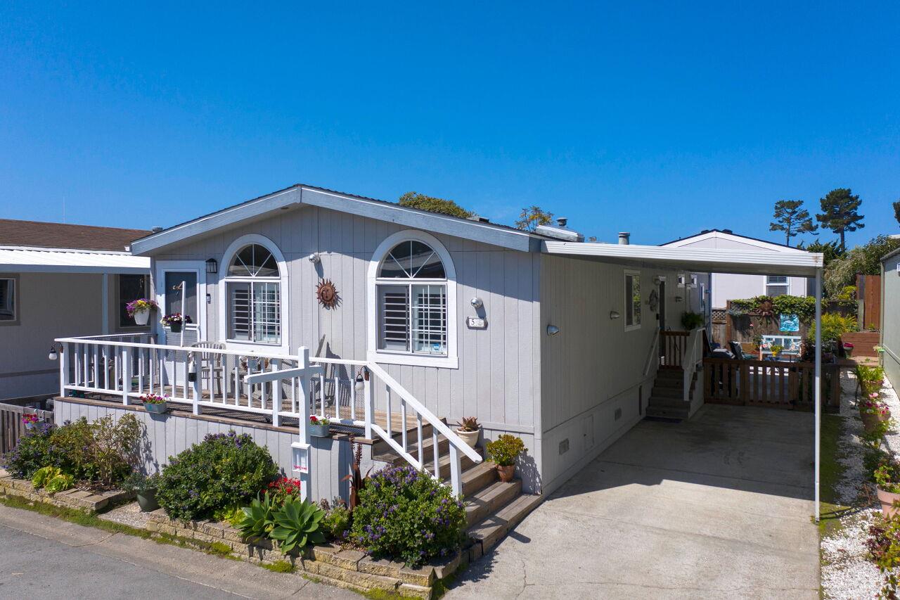 5 Lighthouse Road, Unit 5 Half Moon Bay, CA 94019 - Photo 3 of 25 a front view of a house with a yard