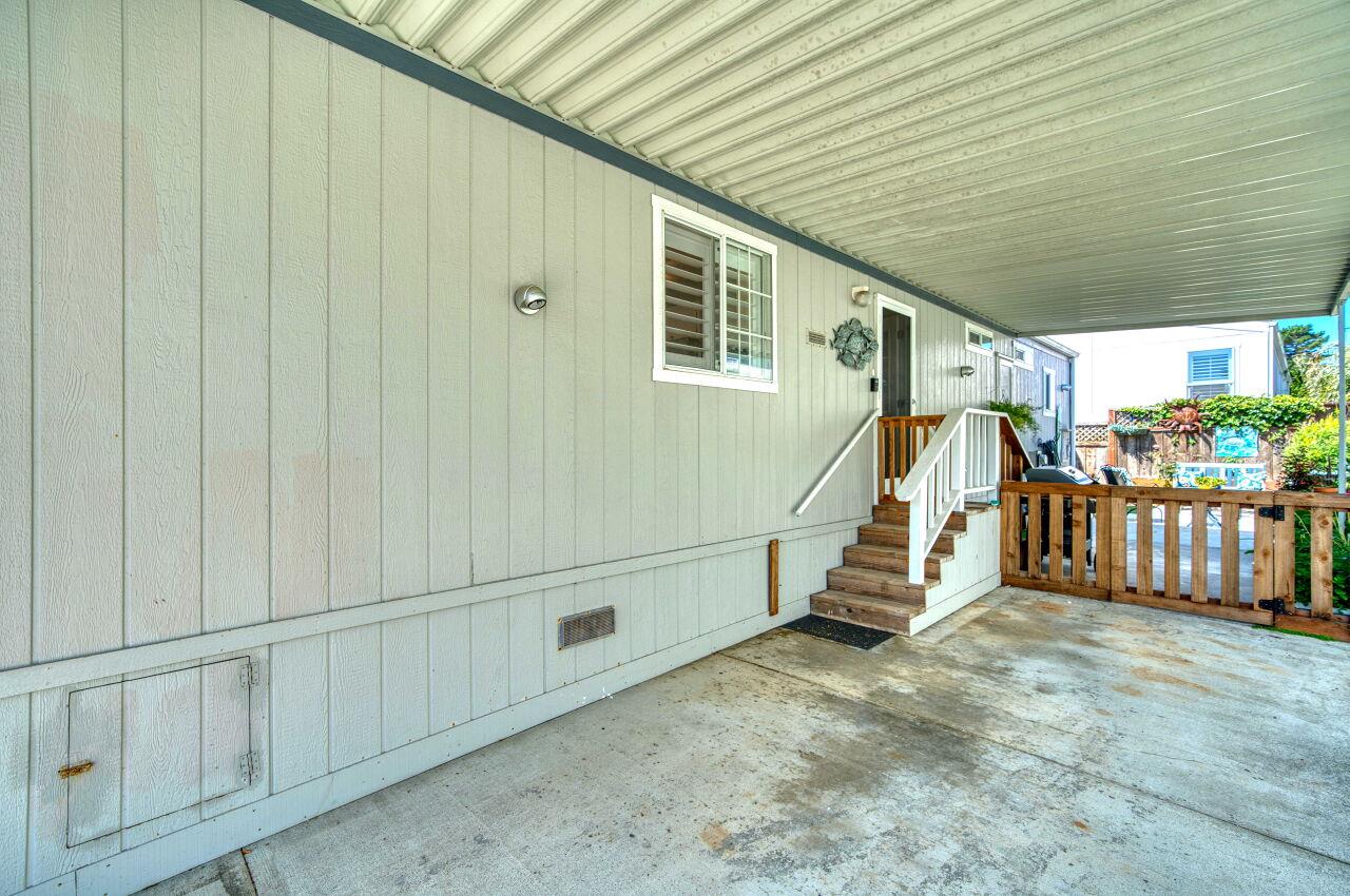 5 Lighthouse Road, Unit 5 Half Moon Bay, CA 94019 - Photo 23 of 25 a view of a house with a wooden deck