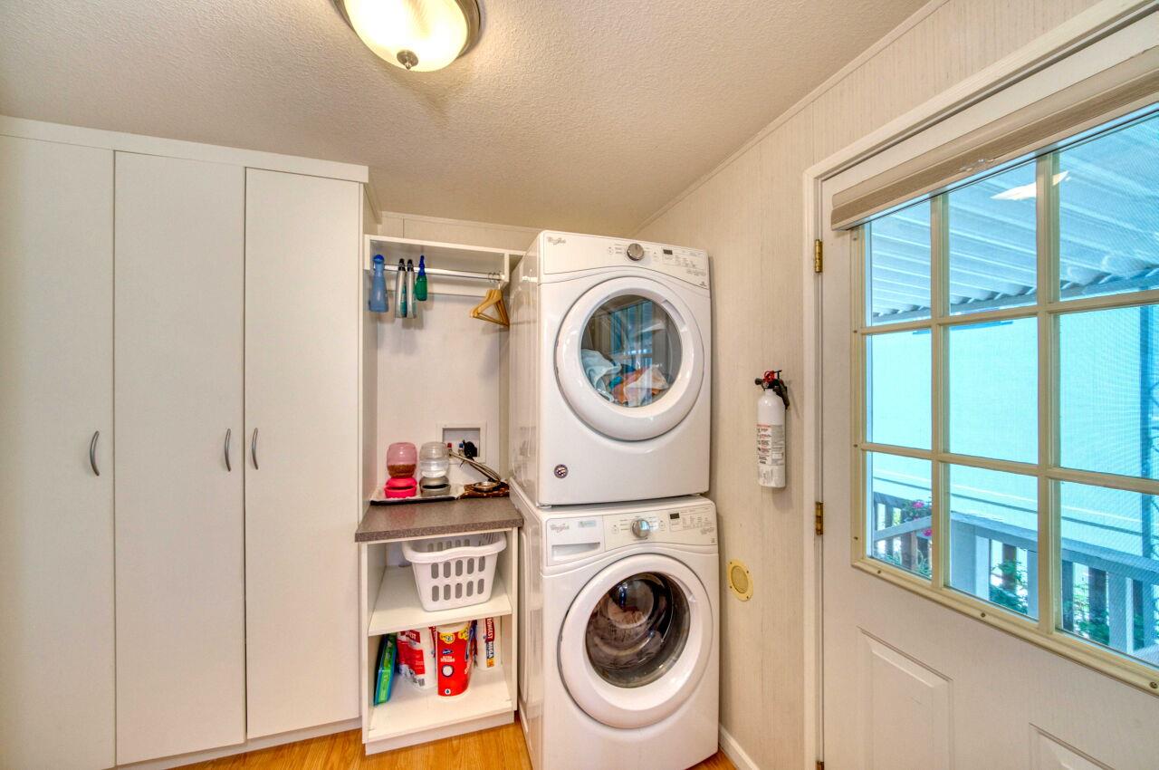 5 Lighthouse Road, Unit 5 Half Moon Bay, CA 94019 - Photo 25 of 25 a utility room with dryer and washer