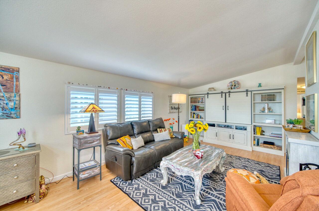 5 Lighthouse Road, Unit 5 Half Moon Bay, CA 94019 - Photo 7 of 25 a living room with furniture and next to a dining room