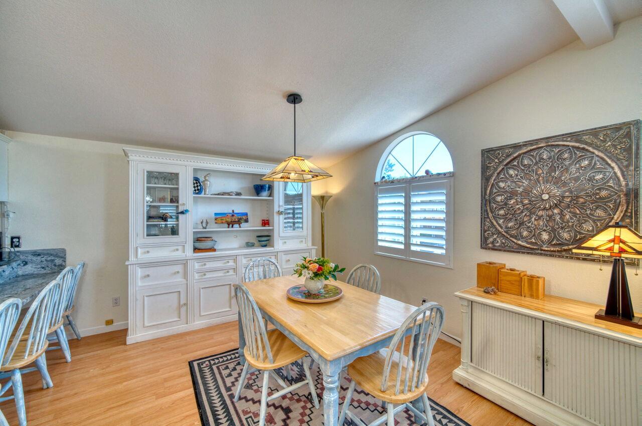5 Lighthouse Road, Unit 5 Half Moon Bay, CA 94019 - Photo 8 of 25 a view of a dining room with furniture window and wooden floor