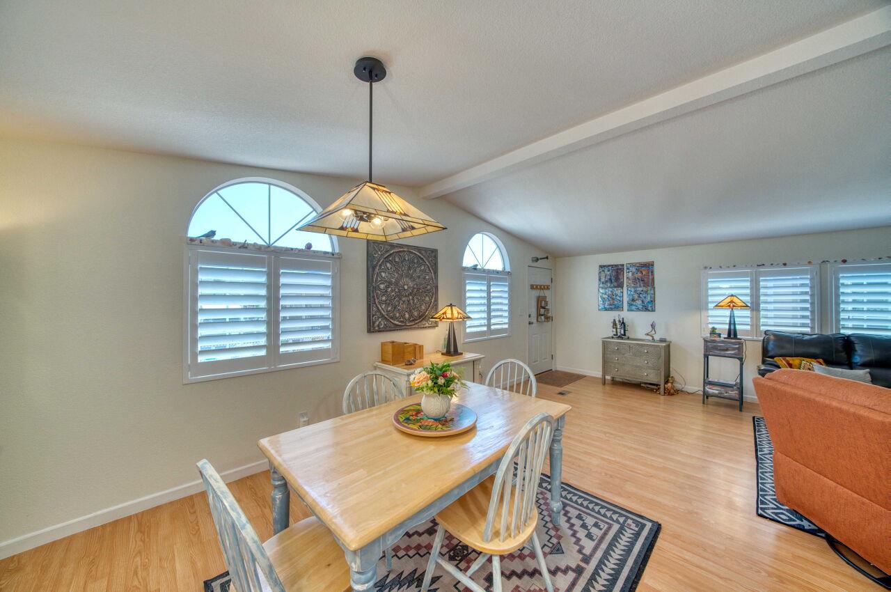 5 Lighthouse Road, Unit 5 Half Moon Bay, CA 94019 - Photo 9 of 25 a view of a dining room with furniture window and wooden floor