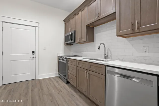 $389,900 | 124 Court Street, Unit 203, Bay St. Louis, MS 39520