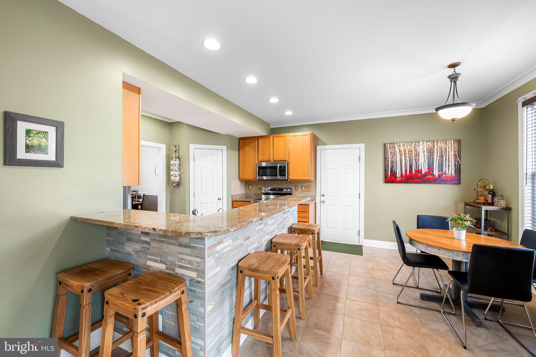 1671 Bay Head Road Annapolis, MD 21409 - Photo 18 of 56 Peninsula bar w/plenty of seating