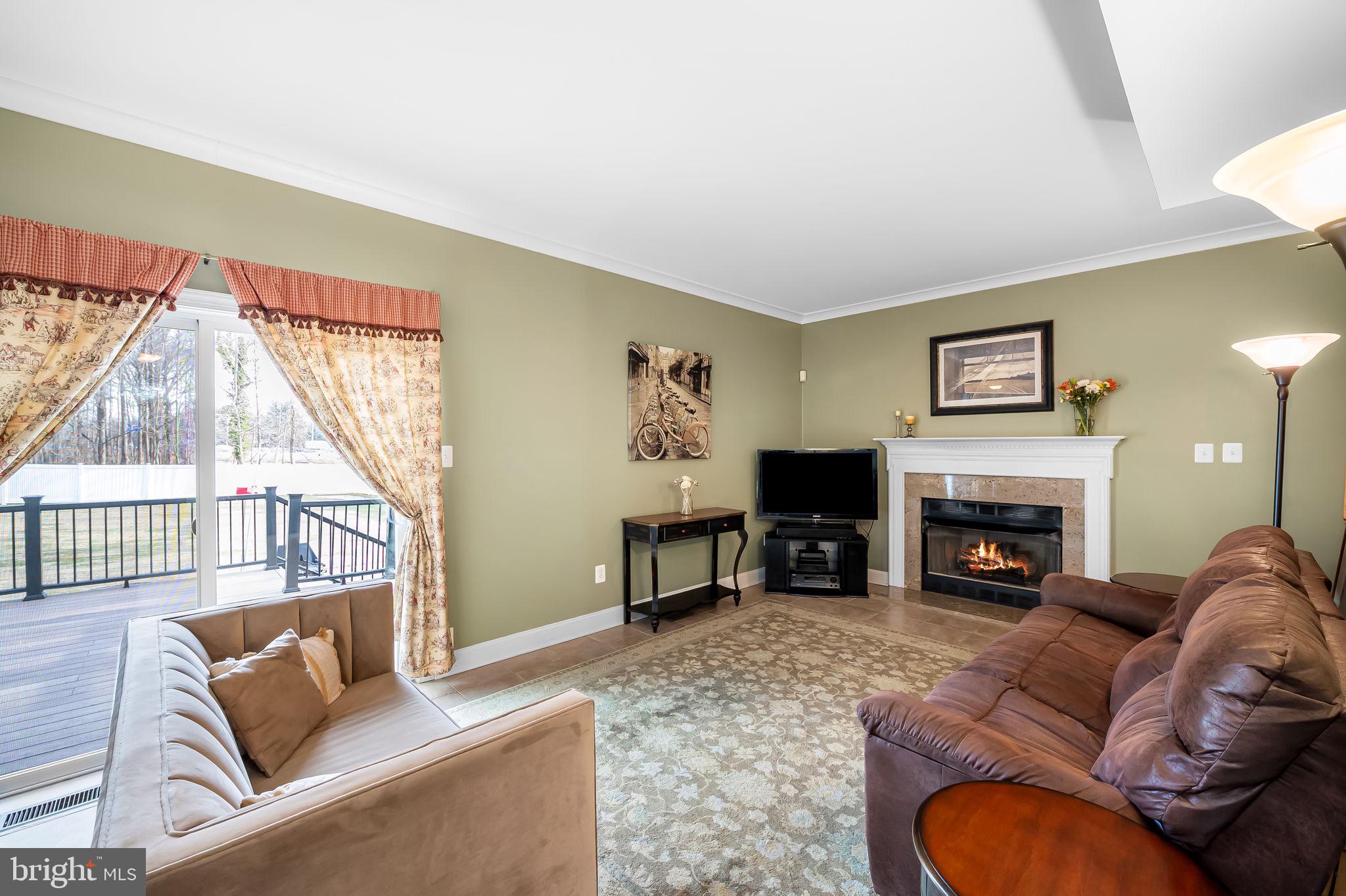 1671 Bay Head Road Annapolis, MD 21409 - Photo 20 of 56 Livingroom off Kitchen w/cozy gas fireplace