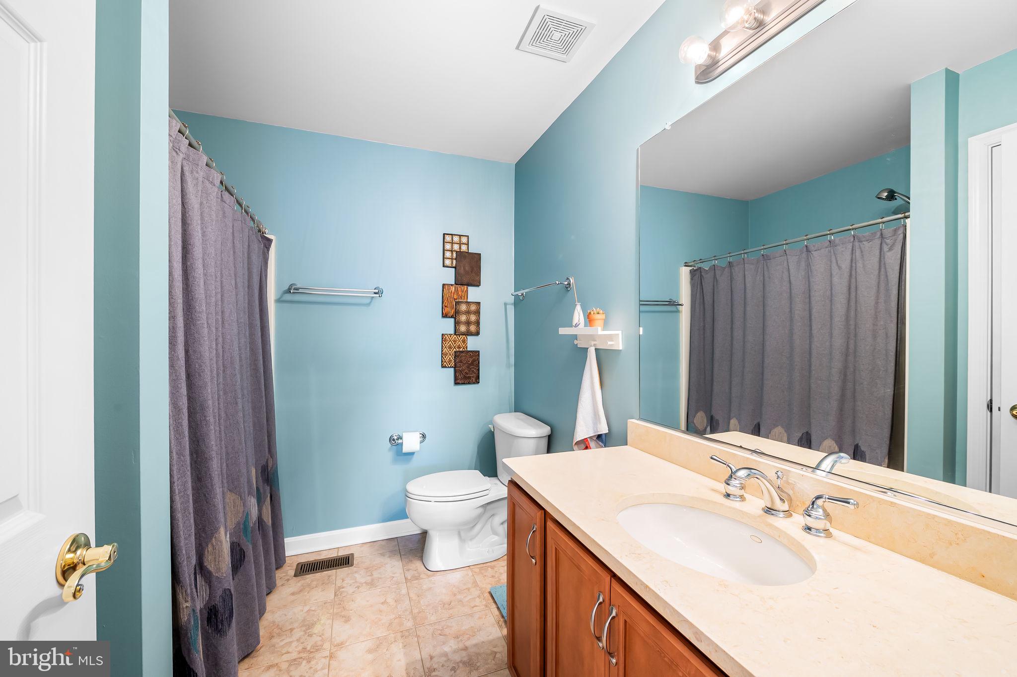 1671 Bay Head Road Annapolis, MD 21409 - Photo 36 of 56 2nd Level full bath w/limestone vanity top