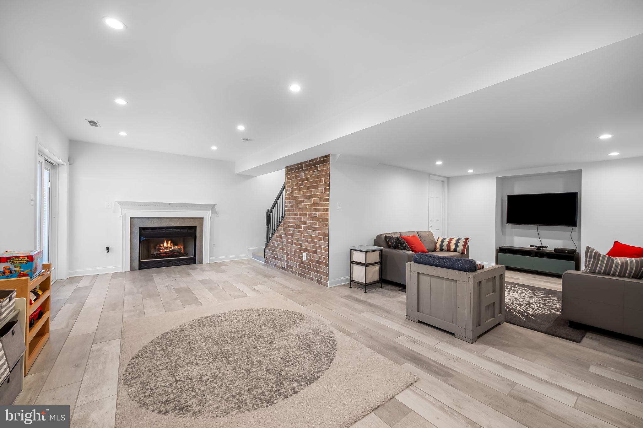 1671 Bay Head Road Annapolis, MD 21409 - Photo 40 of 56 2018 - Finished basement w/2nd gas fireplace