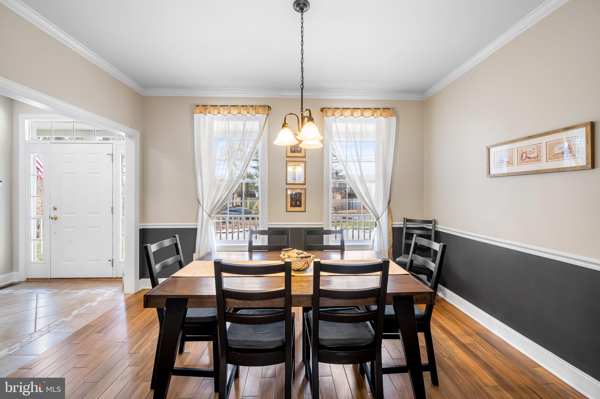 1671 Bay Head Road Annapolis, MD 21409 - Photo 10 of 56 Formal dining room w/crown molding and chair rail