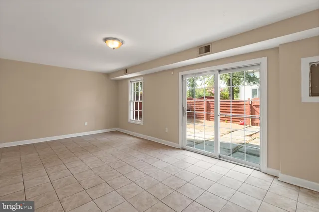 a view of an empty room and window