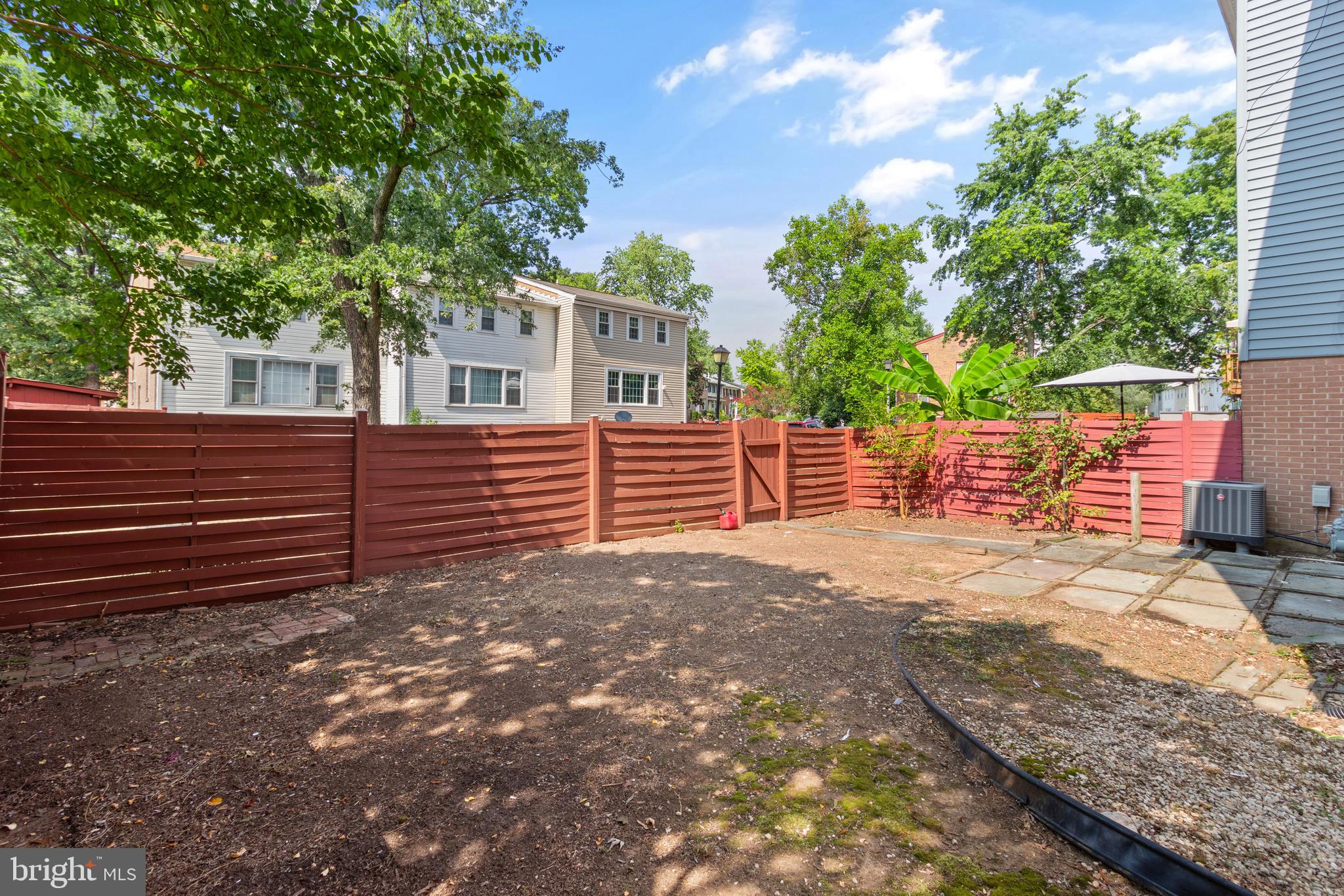 13143 Putnam Circle Woodbridge, VA 22191 - Photo 36 of 38 a view of a house with a yard