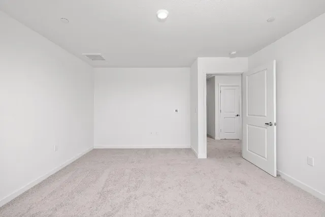 a bathroom with a shower sink and mirror