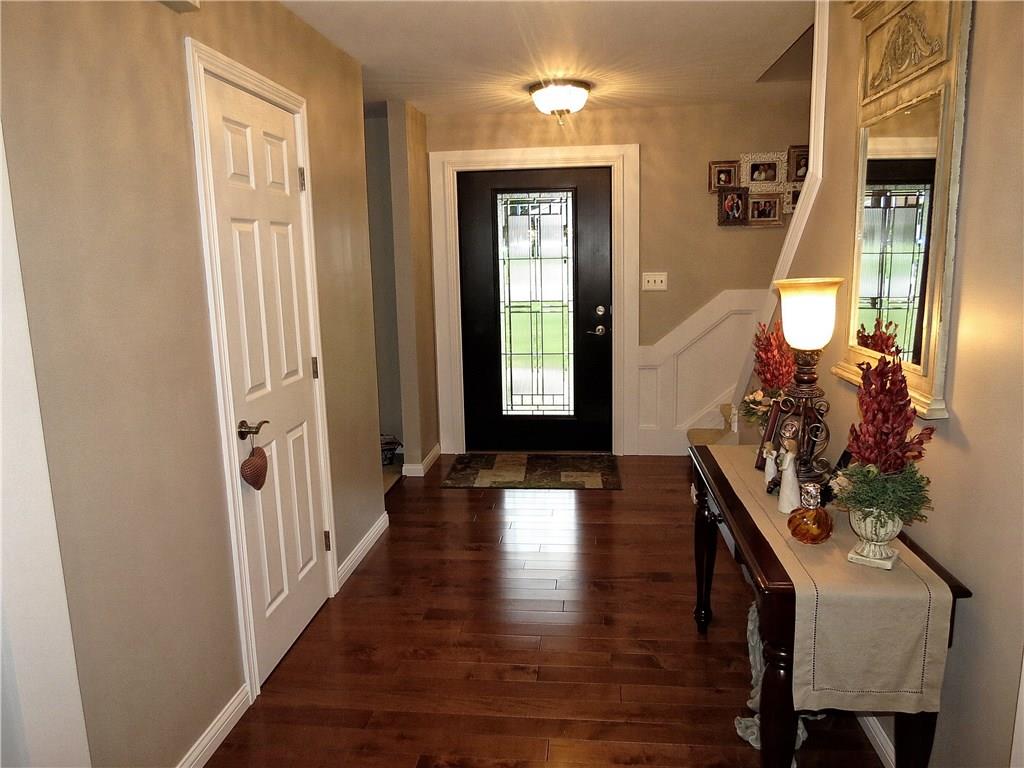 175 Cedar Ridge Drive Monaca, PA 15061 - Photo 2 of 25 The high quality workmanship & detail is immediately apparent when entering the home. The 14X6 foyer is a warm combination of maple hardwood floors & distinguished judges paneling!