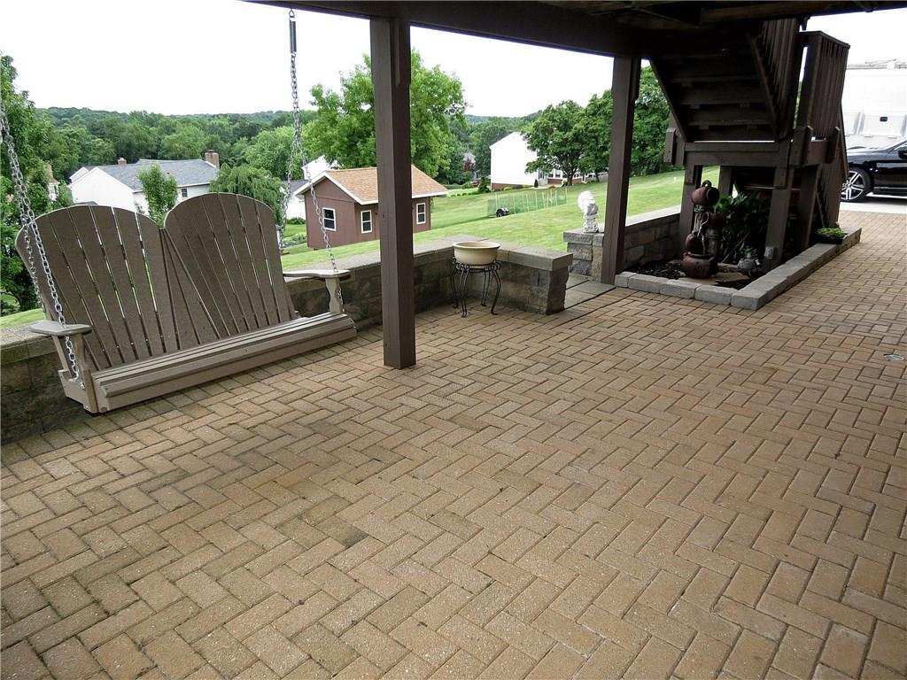 175 Cedar Ridge Drive Monaca, PA 15061 - Photo 23 of 25 An intimate brick patio is a lovely place to unwind!