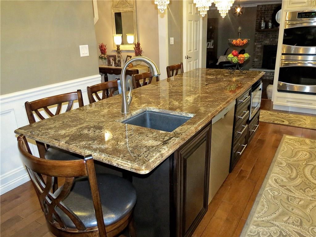 175 Cedar Ridge Drive Monaca, PA 15061 - Photo 6 of 25 This stunning 9X3 island with dedicated prep sink and seating for at least 5 is the focal point of the room and a favorite place to gather!