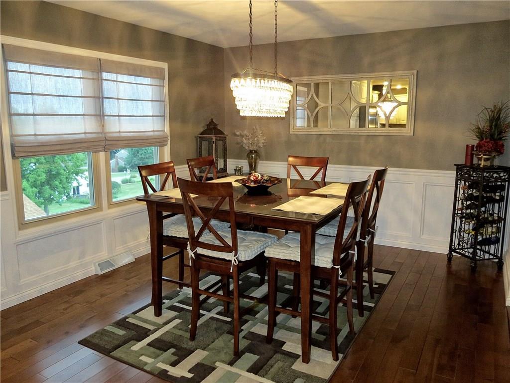 175 Cedar Ridge Drive Monaca, PA 15061 - Photo 7 of 25 The dining area of the kitchen is large enough for over-sized tables - rich judges paneling & elegant lighting lend intimacy to the large room.