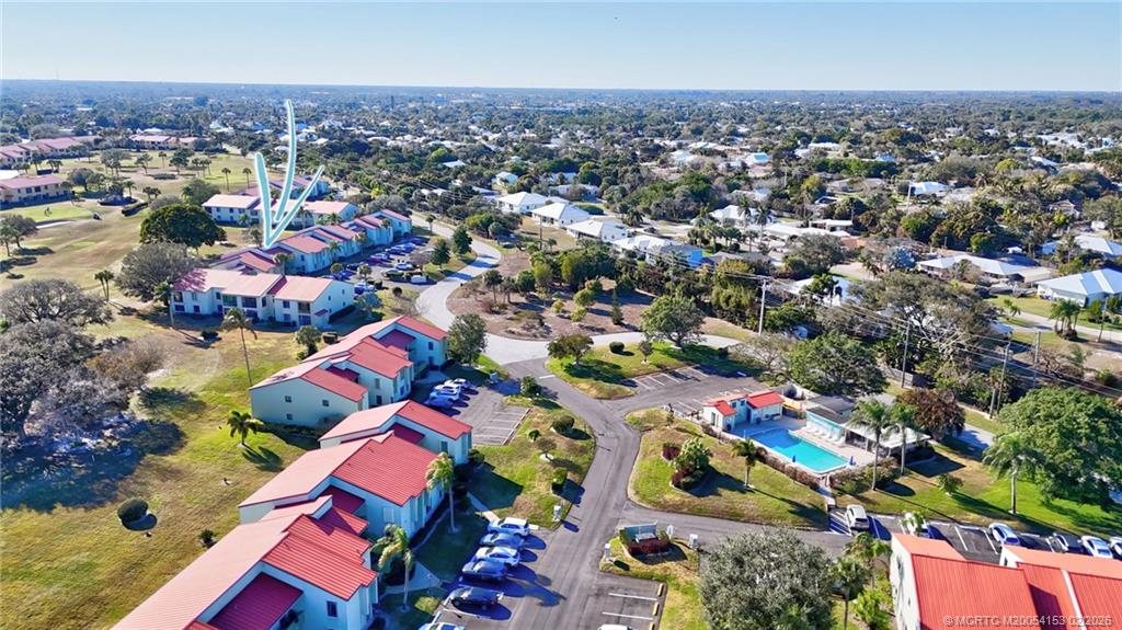 5413 Southeast Miles Grant Road, Unit G206 Stuart, FL 34997 - Photo 54 of 79 an aerial view of a city