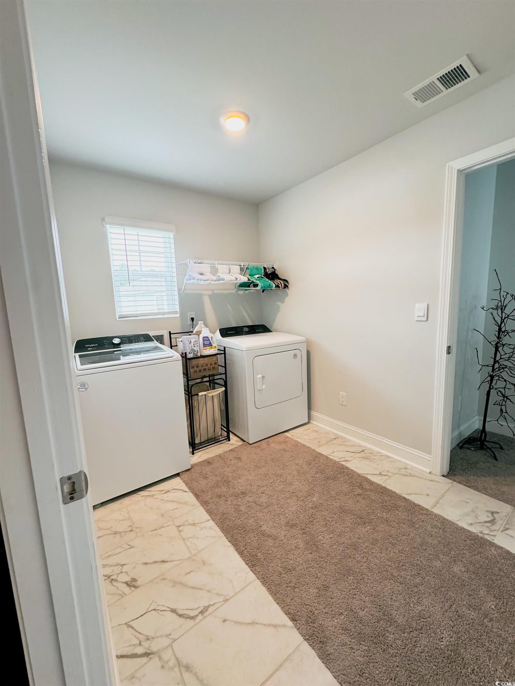 109 Maidenhair Loop Myrtle Beach, SC 29579 - Photo 25 of 39 Laundry area featuring light marble finish floors and independent washer and dryer