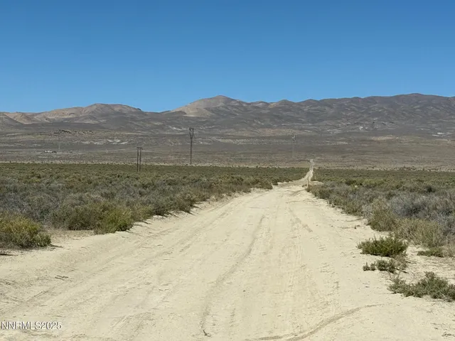 a view of ocean and mountains