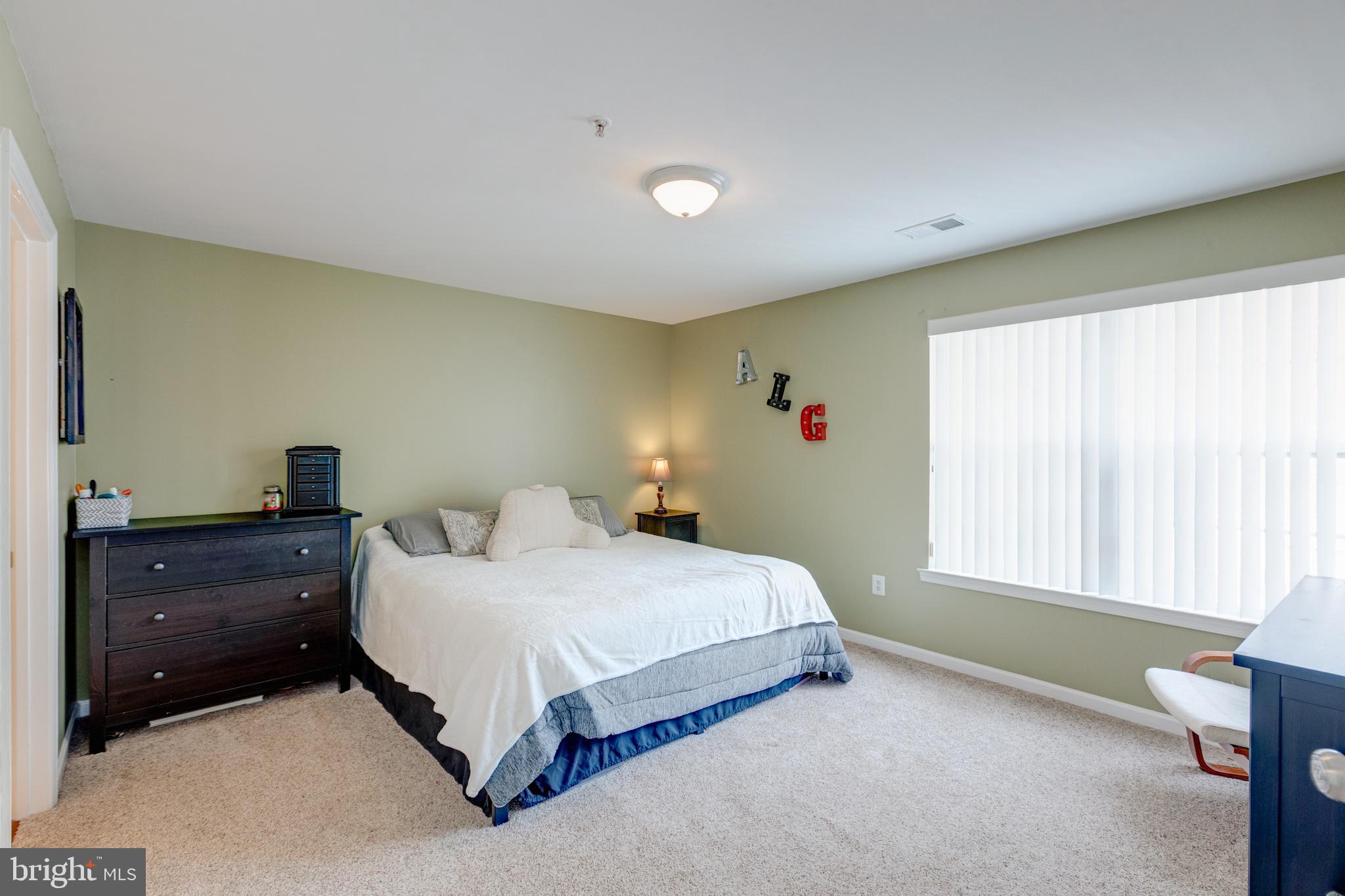 635 Constellation Square Southeast, Unit G Leesburg, VA 20175 - Photo 10 of 15 Primary Bedroom