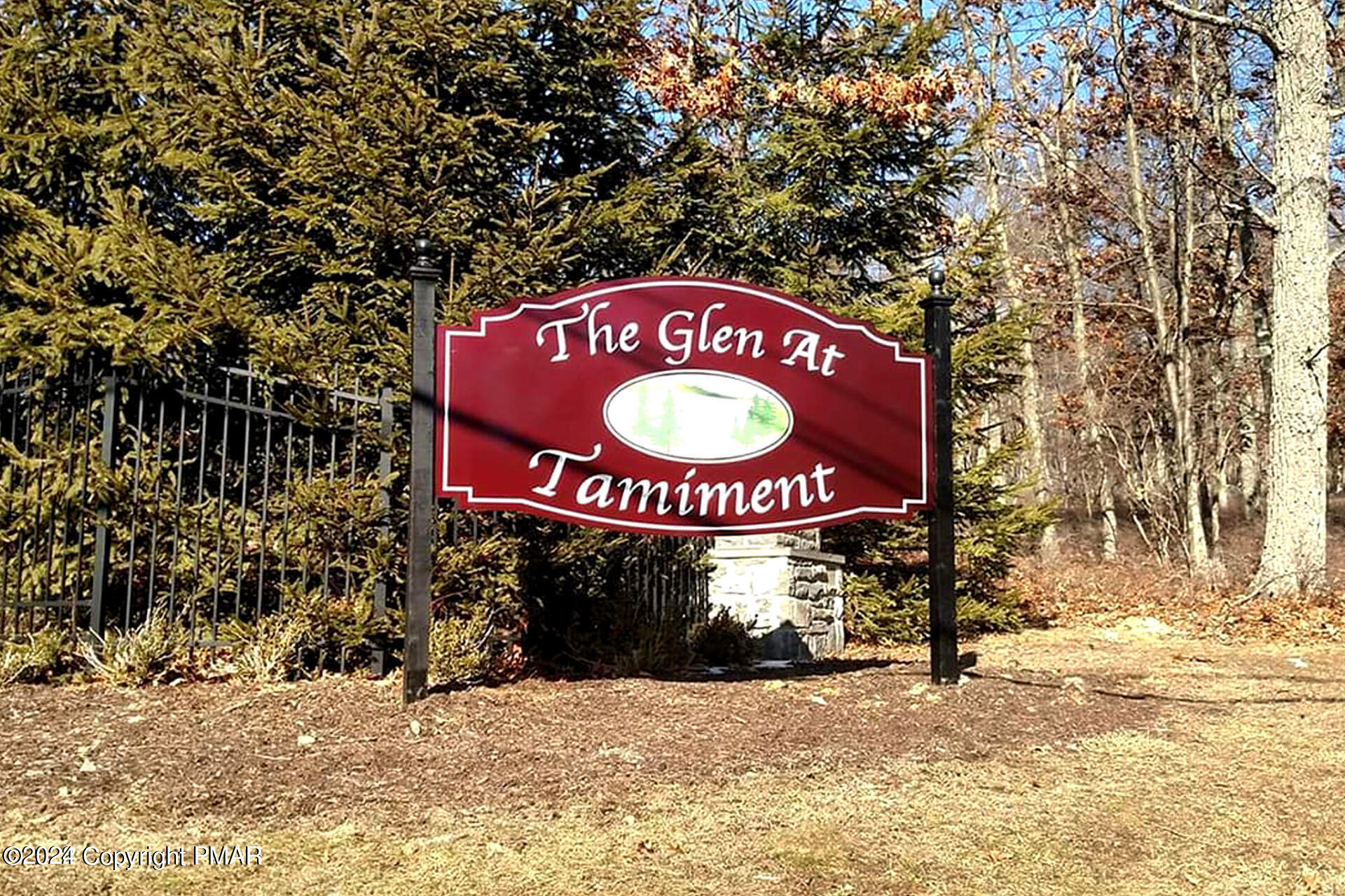 Bindale Road Bushkill, PA 18371 - Photo 3 of 3 a sign that is sitting on a brick wall