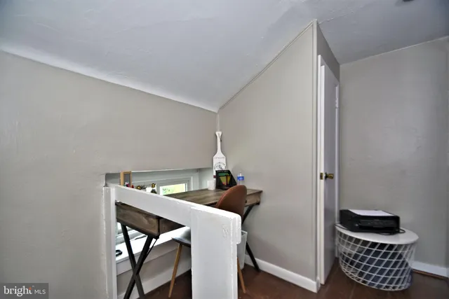 a bathroom with a toilet and a bathtub